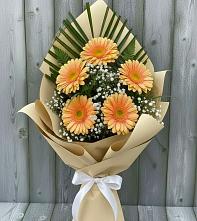 Букет цветов из:  Герберы в Брикет